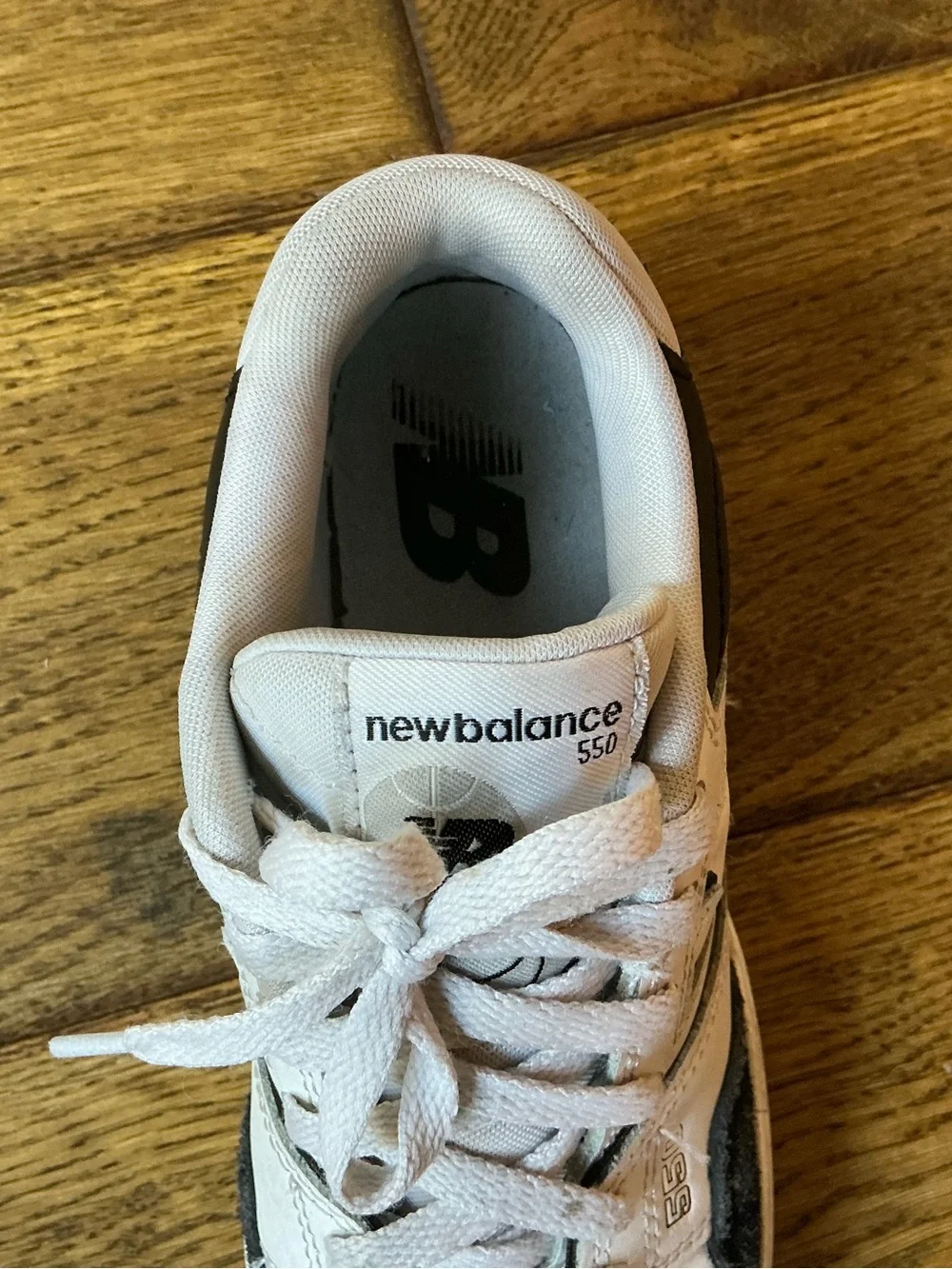 New Balance 550 White and Black Retro Sneakers